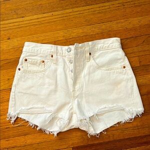 Levi’s white cutoffs, size 27